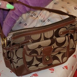 Coach purse with small Rip Needs to be fixed see Photos